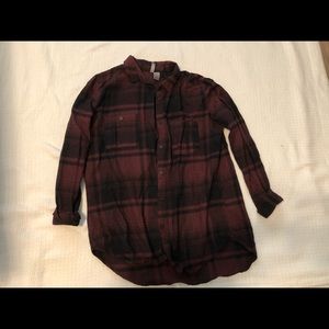 Divided maroon and black flannel blouse